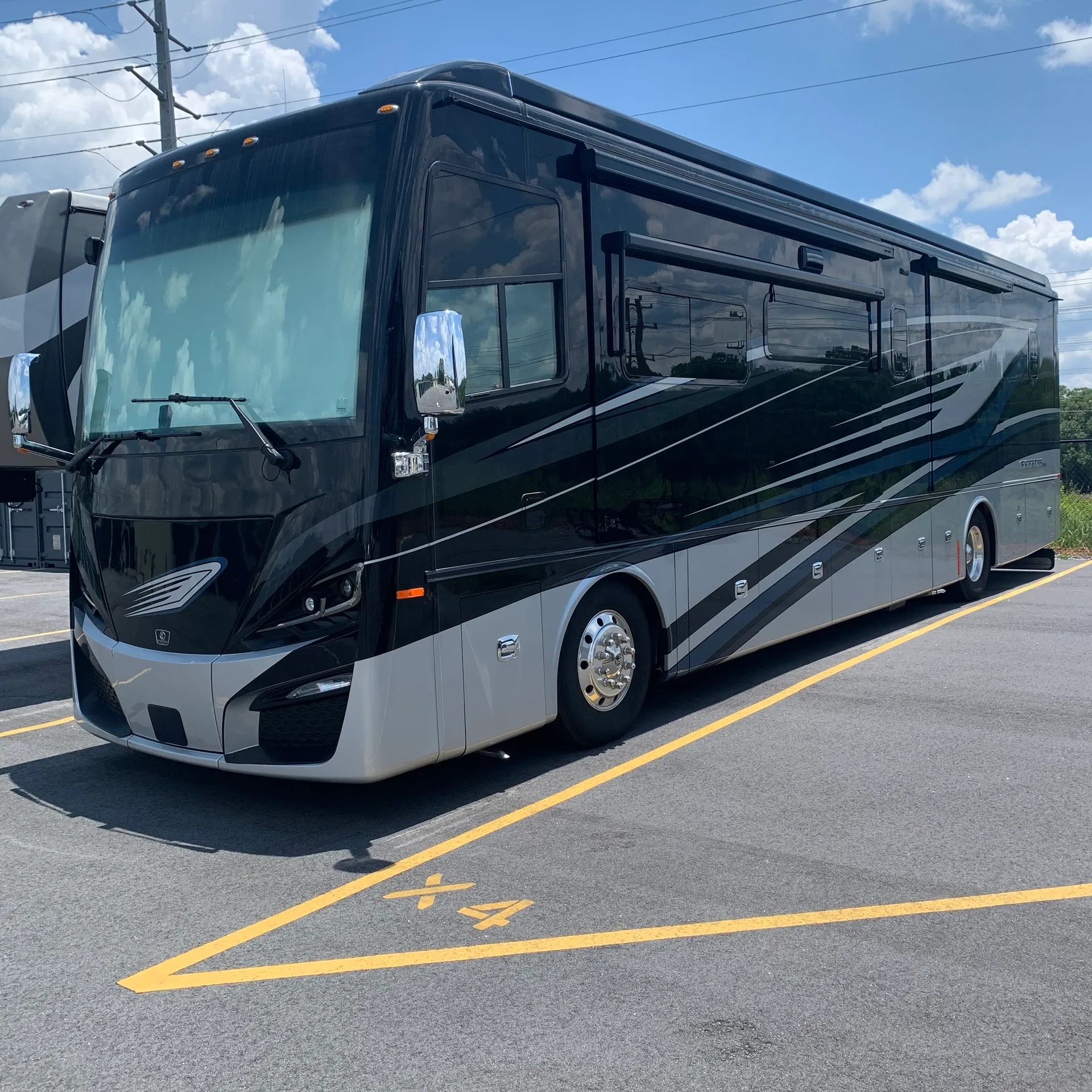 Class A motorhome parked in a marked space at Fork Shoals Road RV and Self Storage in Piedmont, SC